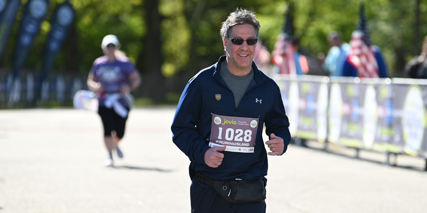 Gary Klausner heads towards the finish line of a 10k race in Long Island, NY. Klausner will celebrate the 25th anniversary of his double lung transplant in December. Photo courtesy of Ed Grenzig. Gary Klausner heads towards the finish line of a 10k race in Long Island, NY.