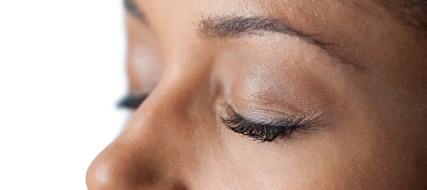woman with eyes closed